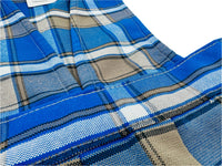 Close-up of blue plaid fabric with a white background